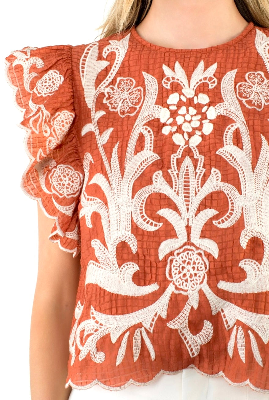 Rust embroidered top